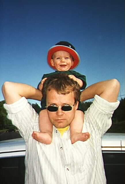 Happy on my dads shoulders